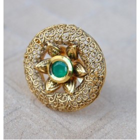 Intricately Designed Cocktail Finger Ring Studded with Emerald